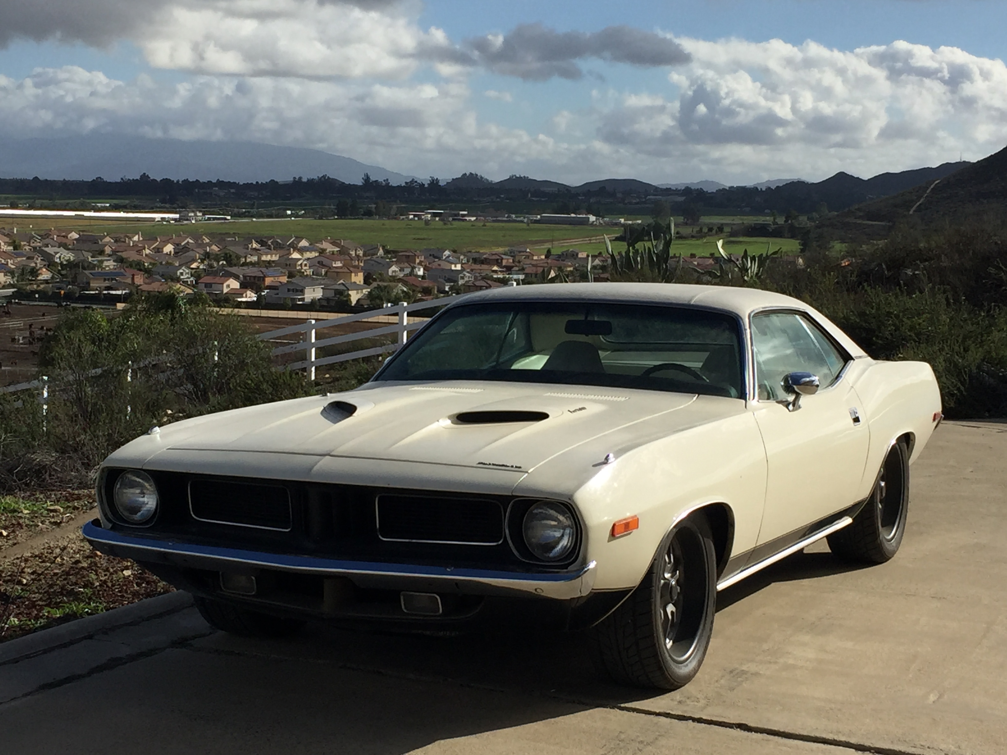 My triple white 73' Cuda 340 4 speed